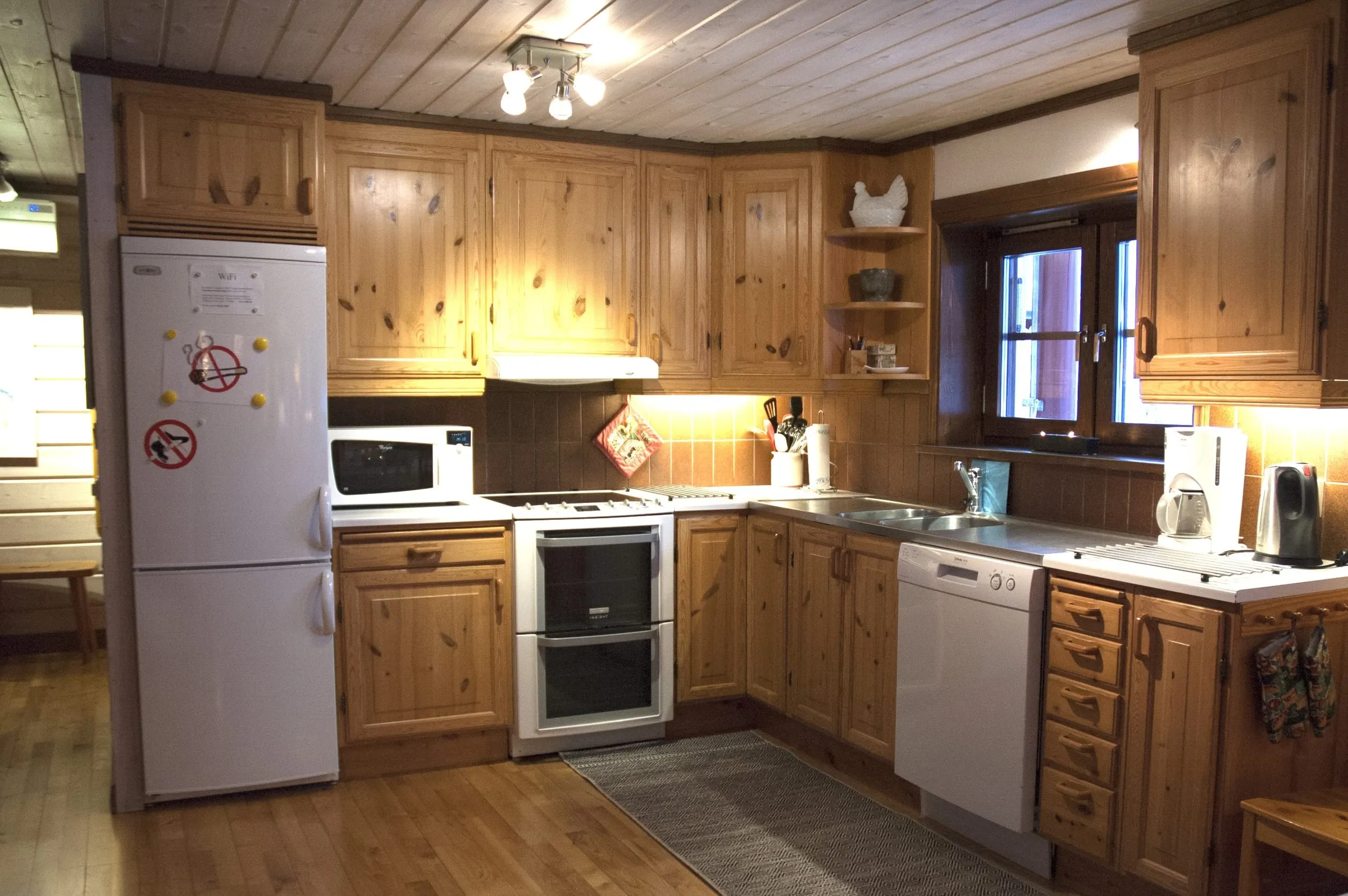 Well equipped kitchen (villa standard) including fridge & freezer, kitchen range with two ovens, microwave and dishwasher.